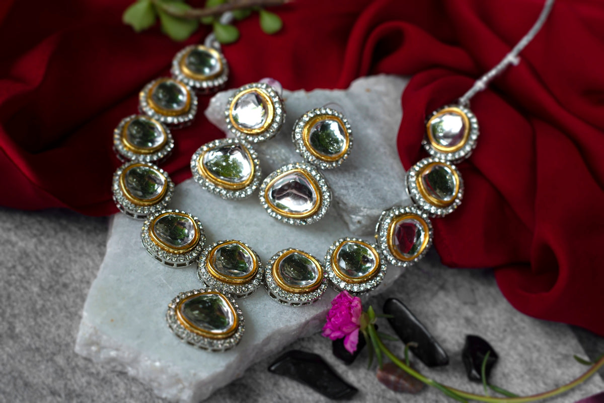 a purse with gold and silver jewelry