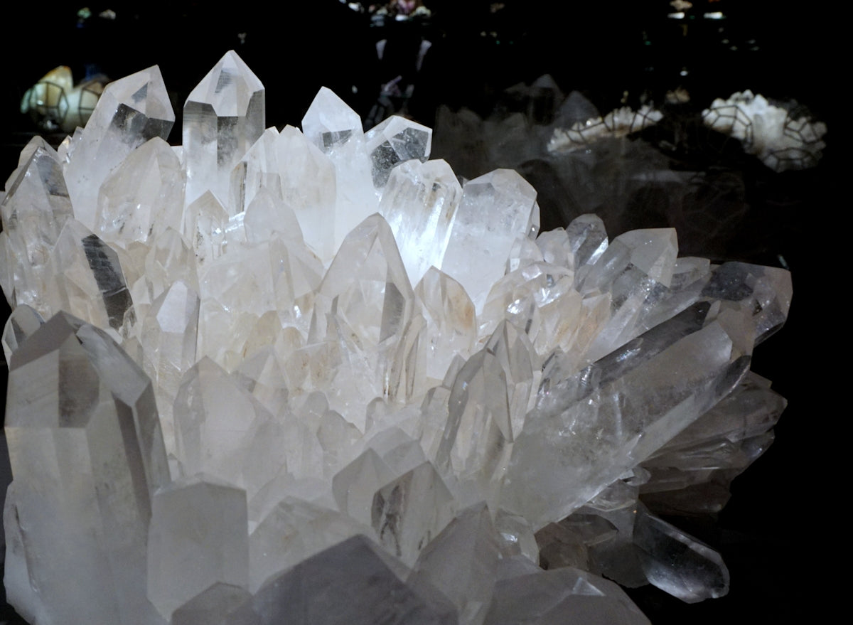 A cluster of crystals sitting on top of a table
