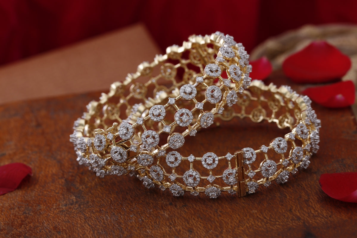A couple of rings sitting on top of a wooden table