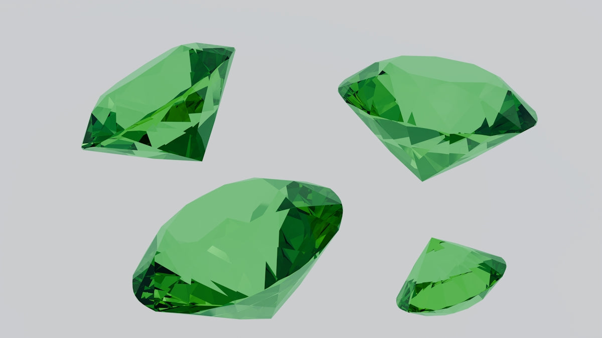 A group of green diamonds sitting on top of a table