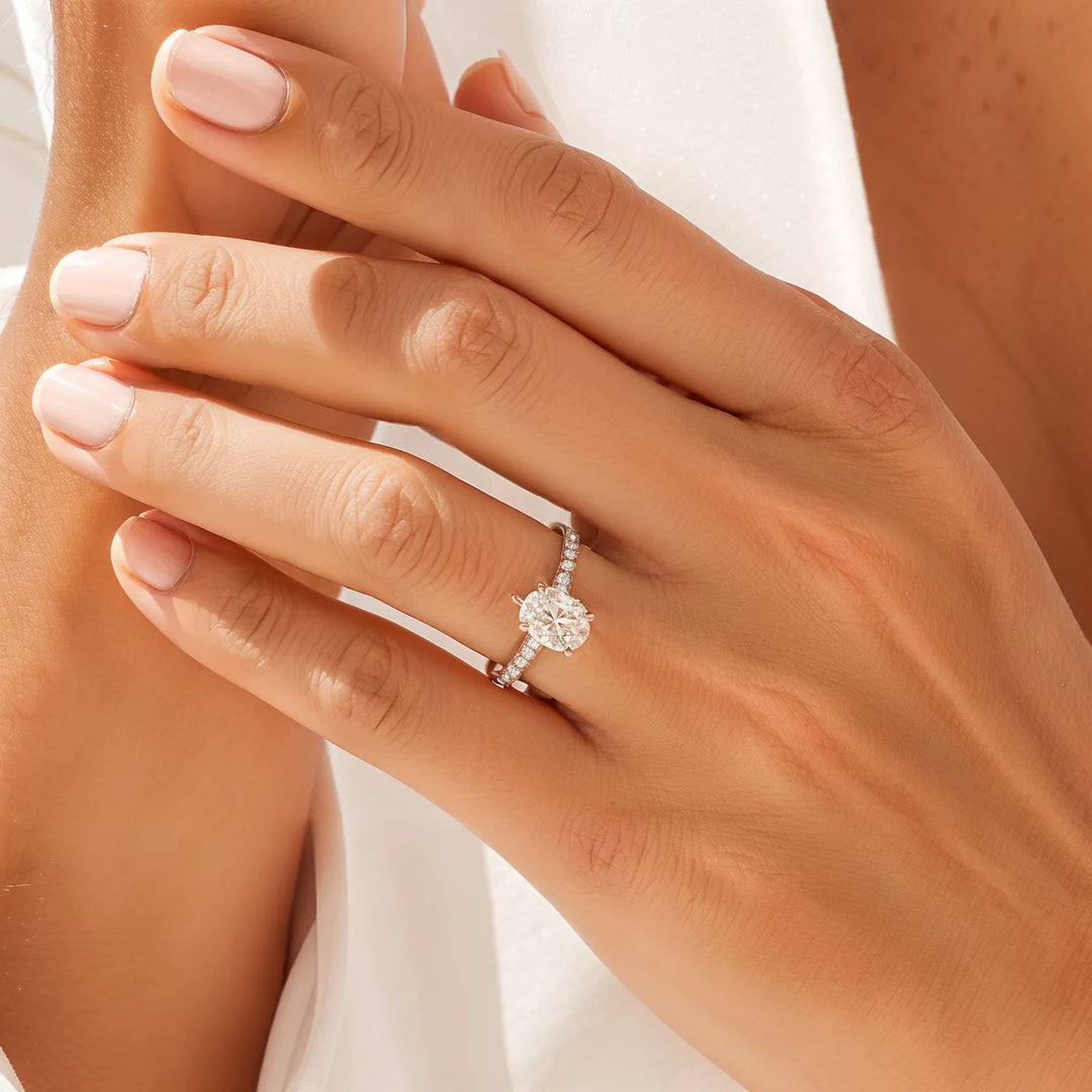 Pear Cut Cathedral Engagement Ring with Scalloped Pavé Halo