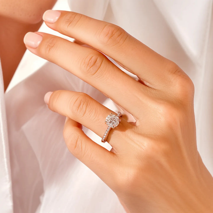 Round Cut Cathedral Engagement Ring with Pavé Diamond Band