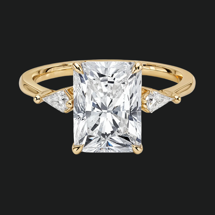 Cometa Radiant Cut Three Stone Diamond Accents Engagement Ring in 9kt White Gold