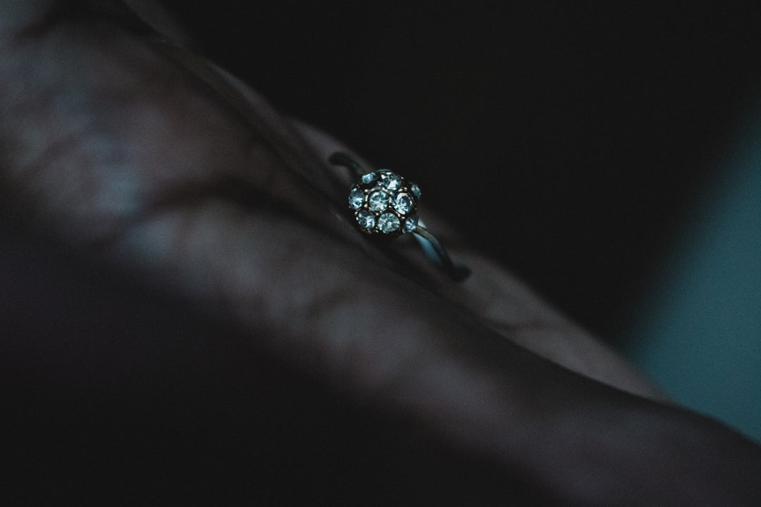 clear gemstone silver-colored solitaire ring