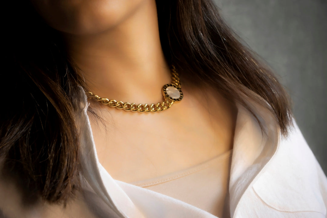 a woman with a necklace