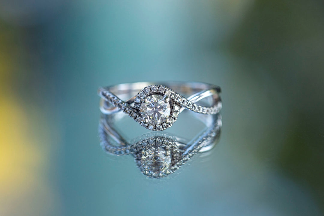 a diamond ring on a blue background
