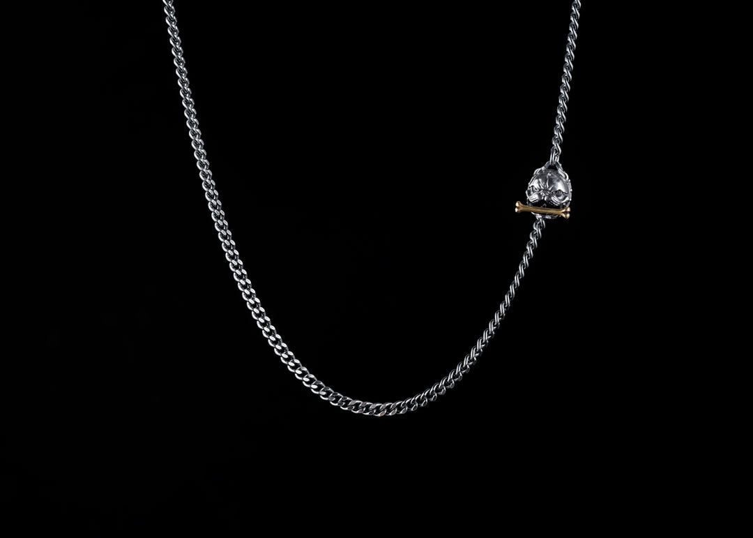 a diamond necklace on a black background