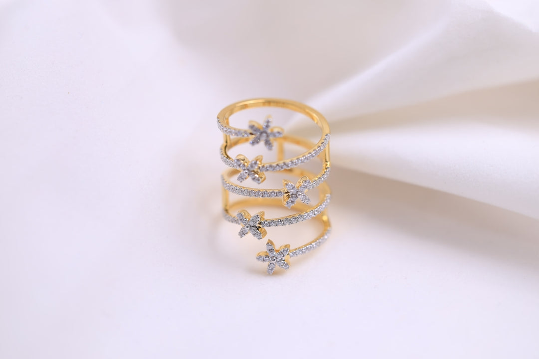 a diamond ring on a white cloth