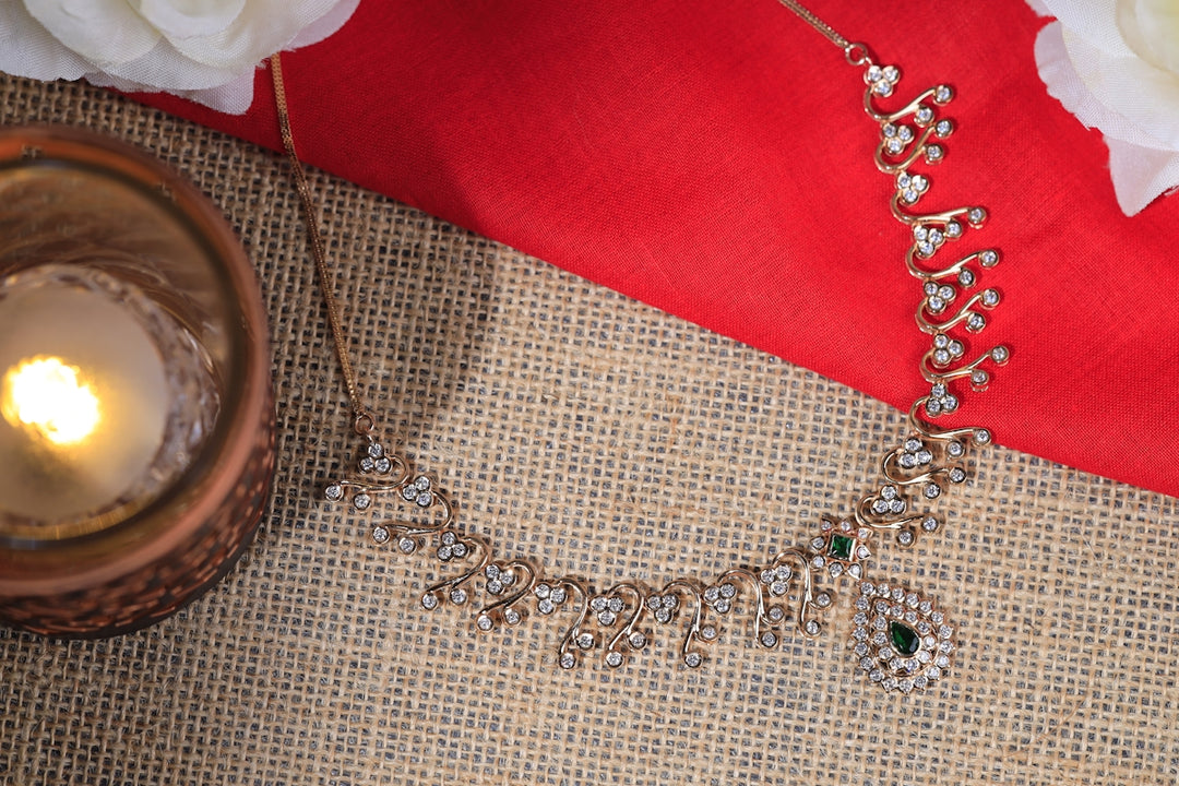 a close up of a necklace on a table