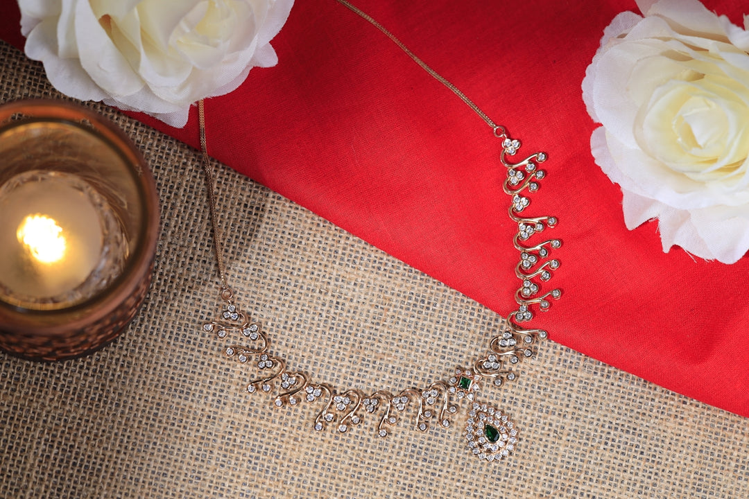 a close up of a necklace on a table