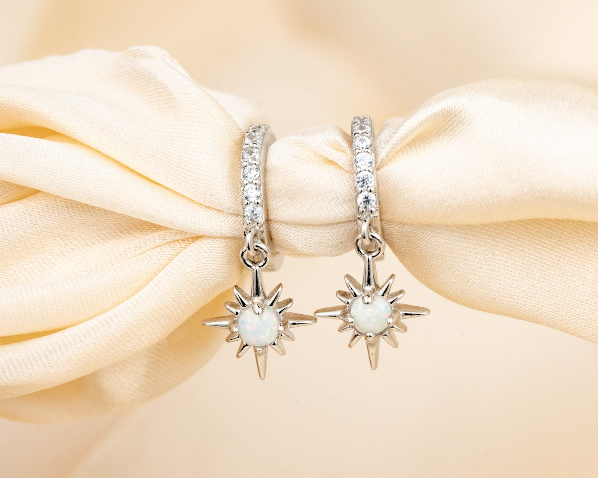 A close up of a pair of earrings