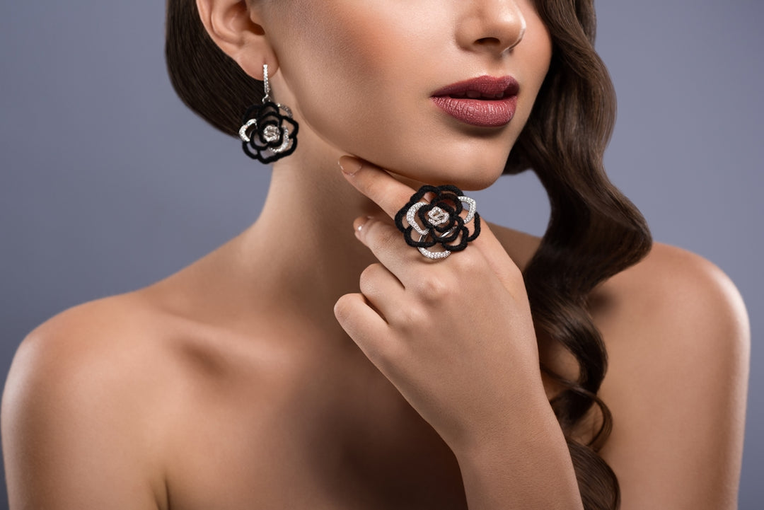A beautiful woman with long hair wearing earrings