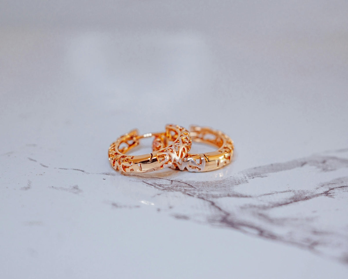 A close up of two rings on a table