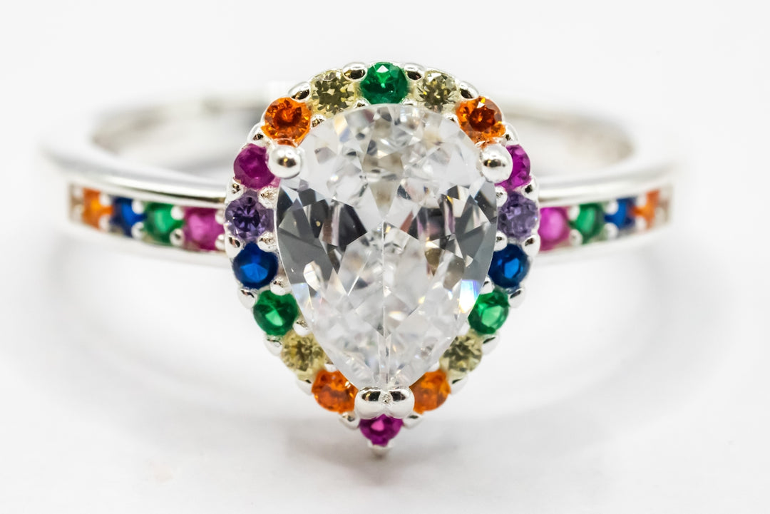 A white diamond ring with multicolored stones