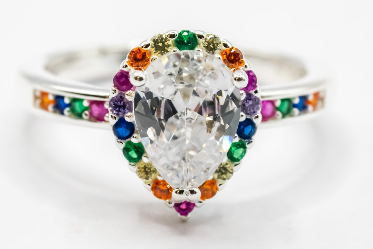 A white diamond ring with multicolored stones