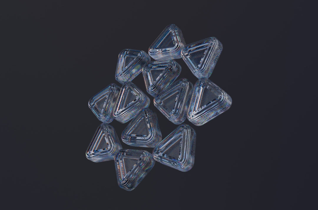 Triangular, translucent objects are clustered together.