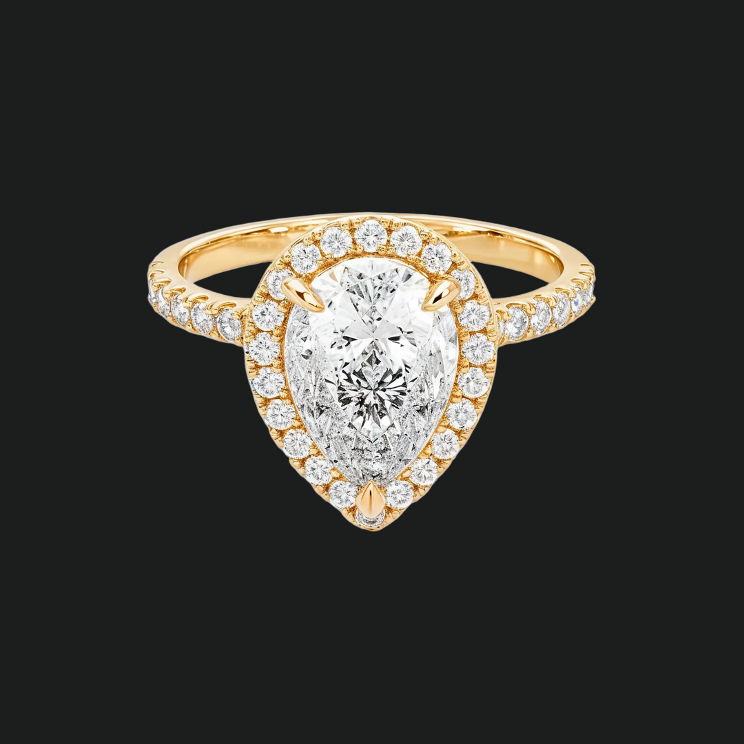 Pear Cut Halo Engagement Ring with Diamond Accents in 9kt White Gold