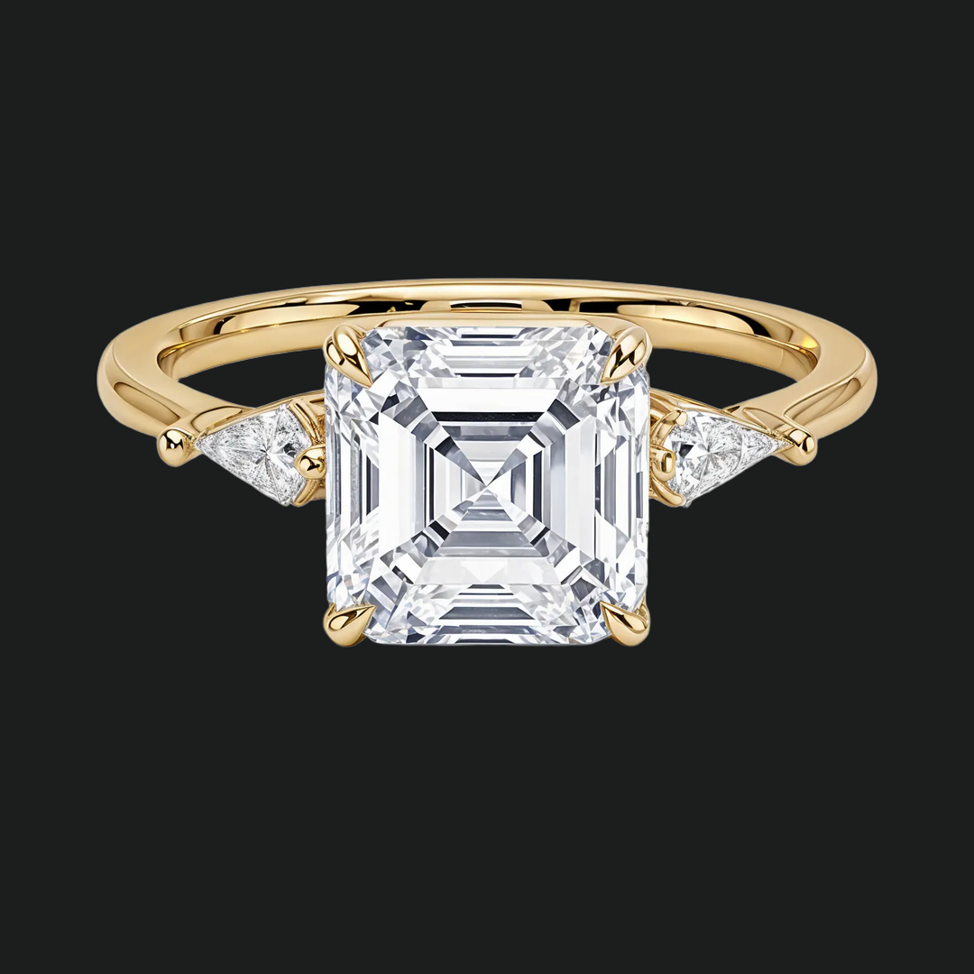 Cometa Asscher Cut Three Stone Diamond Accenten verlovingsring in 9kt witgoud