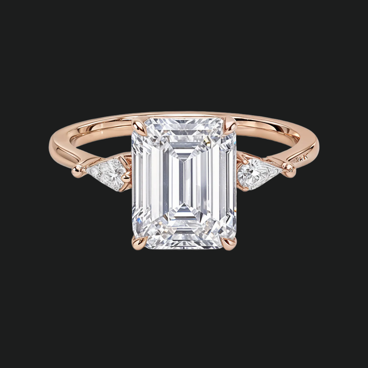 Cometa Emerald Cut Three Stone Diamond Accenten verlovingsring