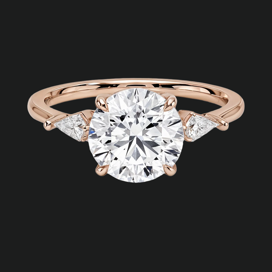 Cometa drie stenen ronde diamant accenten verlovingsring