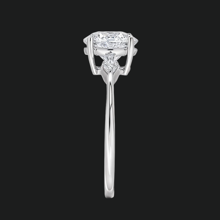 Cometa drie stenen ronde diamant accenten verlovingsring