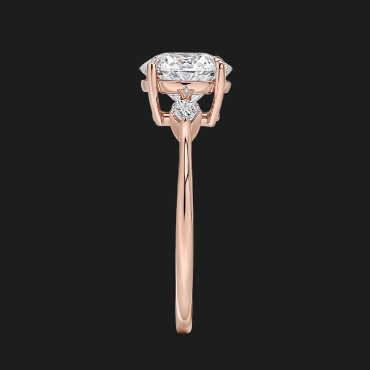 Cometa drie stenen ronde diamant accenten verlovingsring