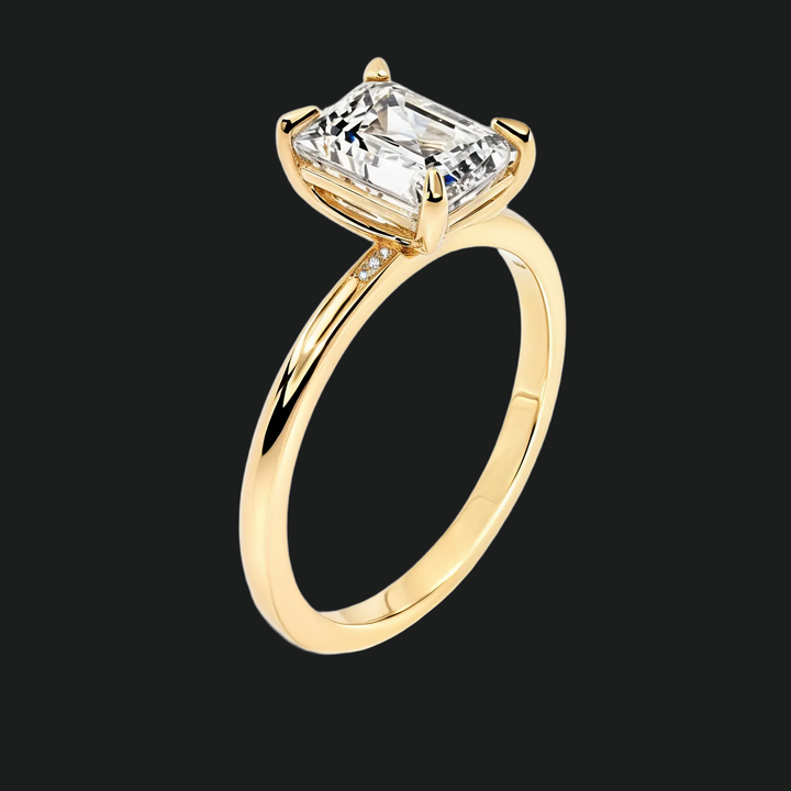Emerald Cut Solitaire verlovingsring met diamantaccenten