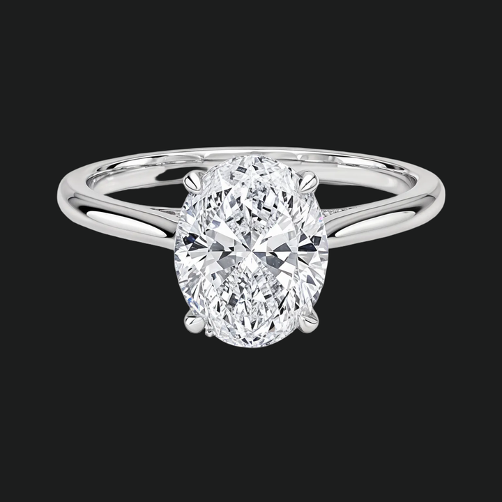 Ovaal gesneden verborgen halo -verlovingsring met diamantaccenten
