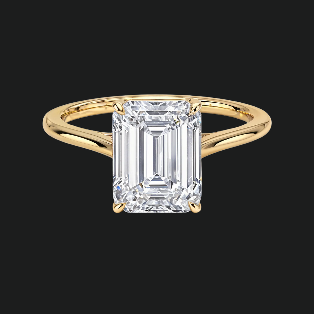 Petite Emerald Cut Solitaire Engagement Ring in 9kt White Gold