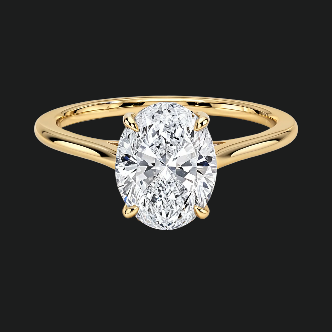 Petite Oval Solitaire Engagement Ring in 9kt White Gold