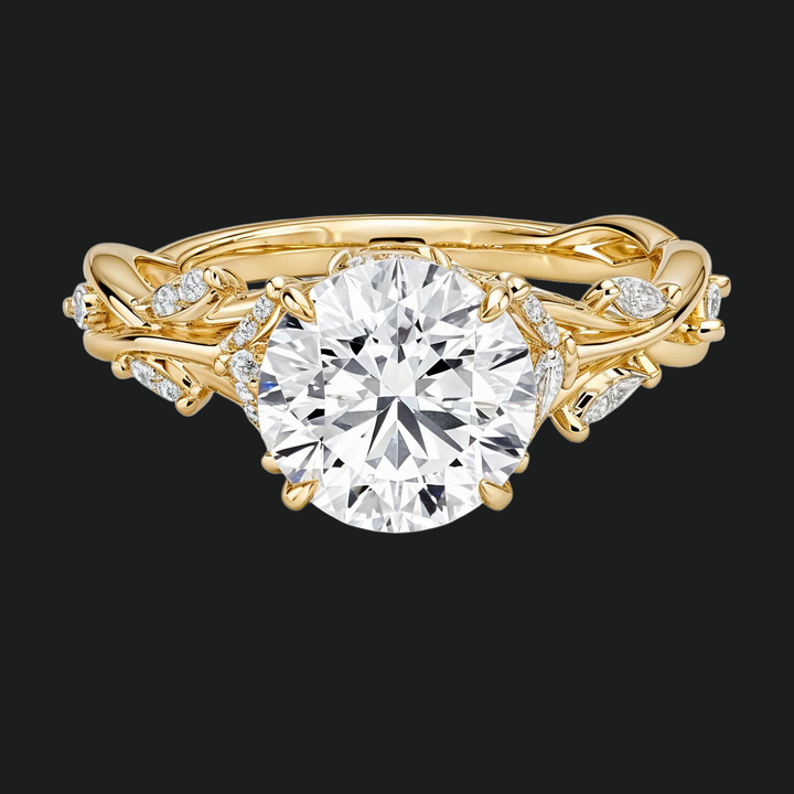 Fluisterende wijnstokken rond diamant accenten verlovingsring in 9kt witgoud