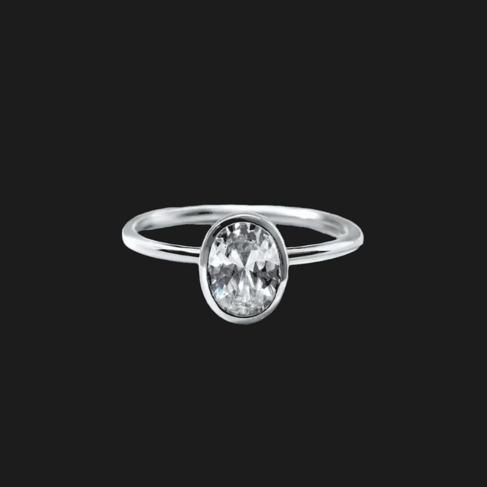 Anello con Diamante a Taglio Ovale e Montatura a Fascia
