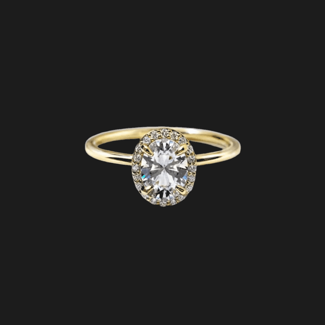 Anello di Fidanzamento con Diamante Ovale e Alone in Oro Giallo 18K