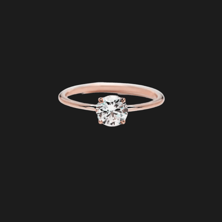Anello Solitario Principessa Diamante Oro Rosa 18K Tondo