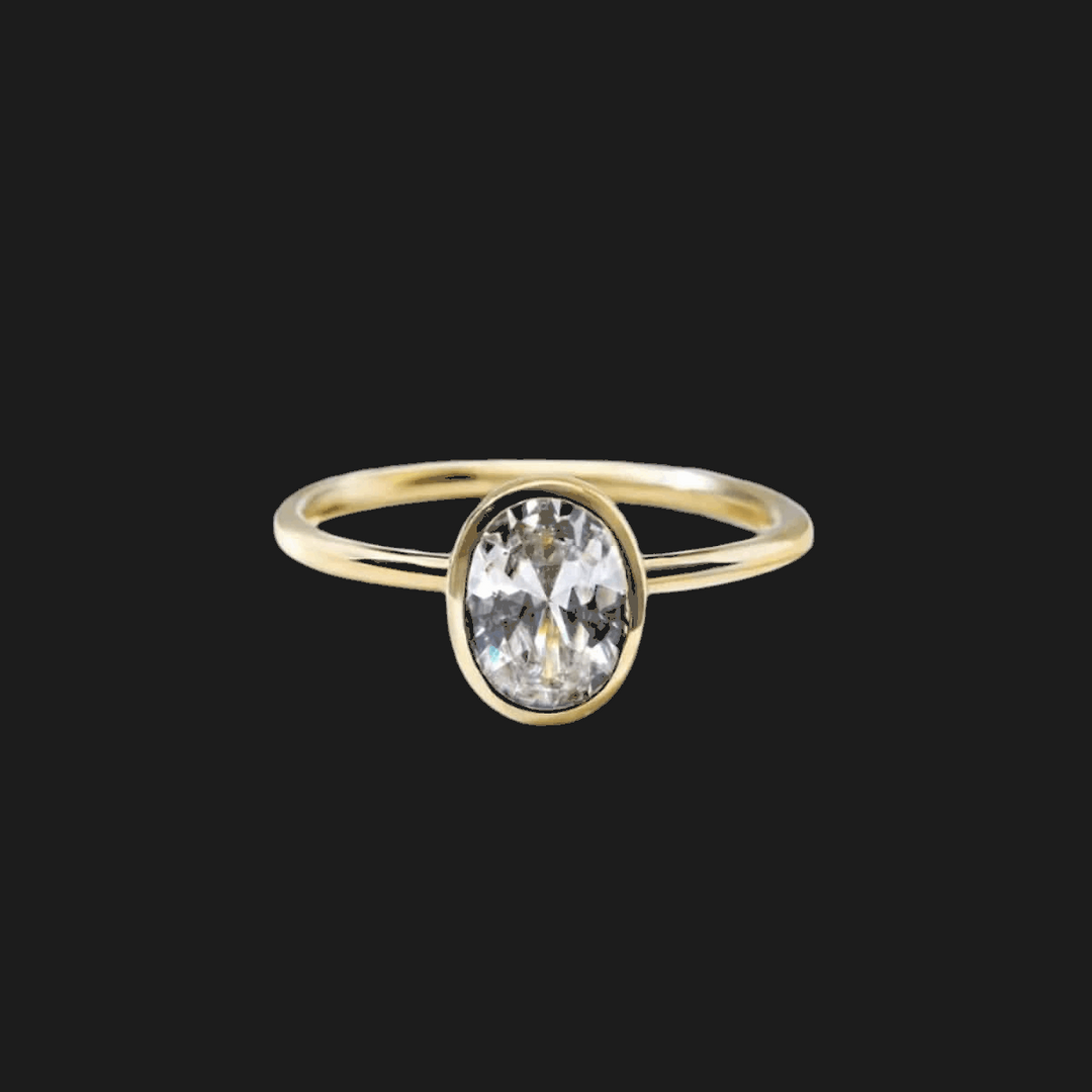 Radiant Bezel Set Diamond Ring 18K Yellow Gold Oval